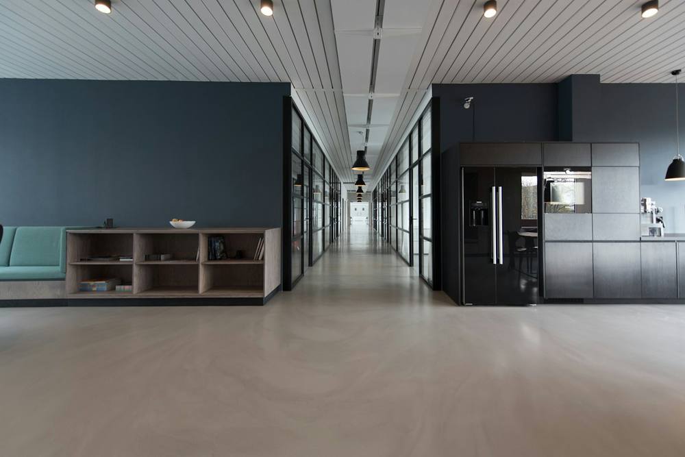 Clean commercial office corridor with polished floors